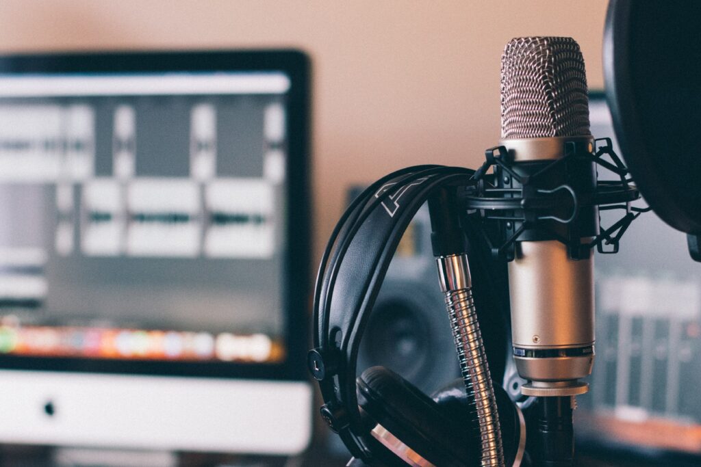 Cover image of a podcast studio step-up including a microphone